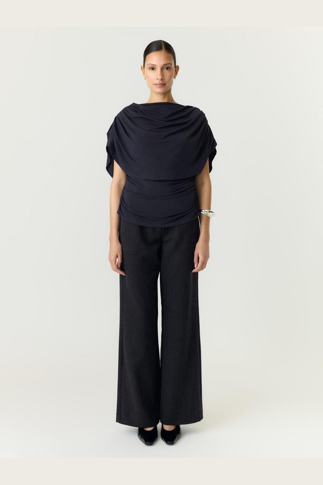 YAS - Yasdrala Cape Top Story - 5185840 Asphalt